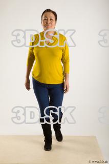 Walking reference of yellow sweater blue jeans Gwendolyn 0002
